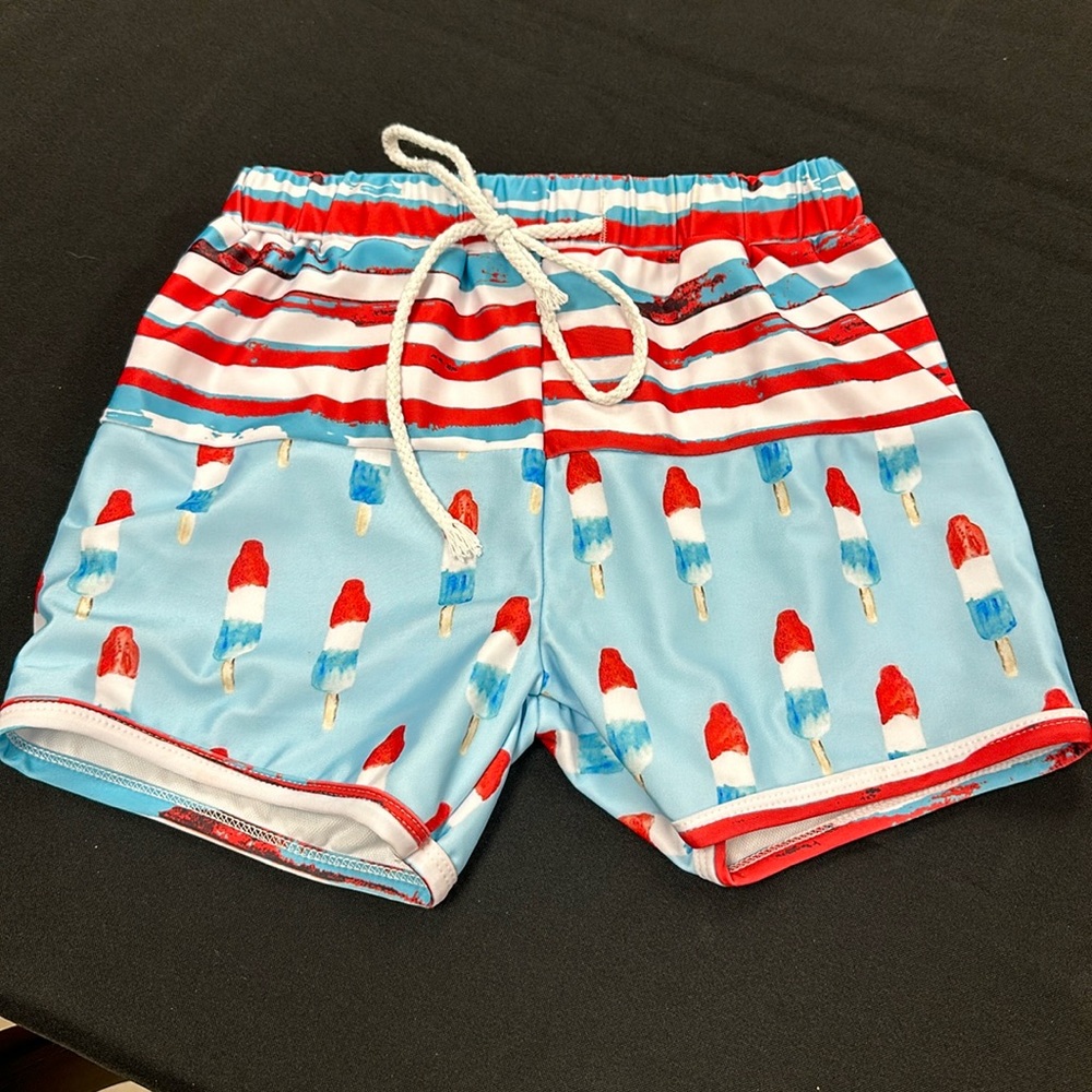 Sassy stitches bomb pop swim trunks made with no netting.